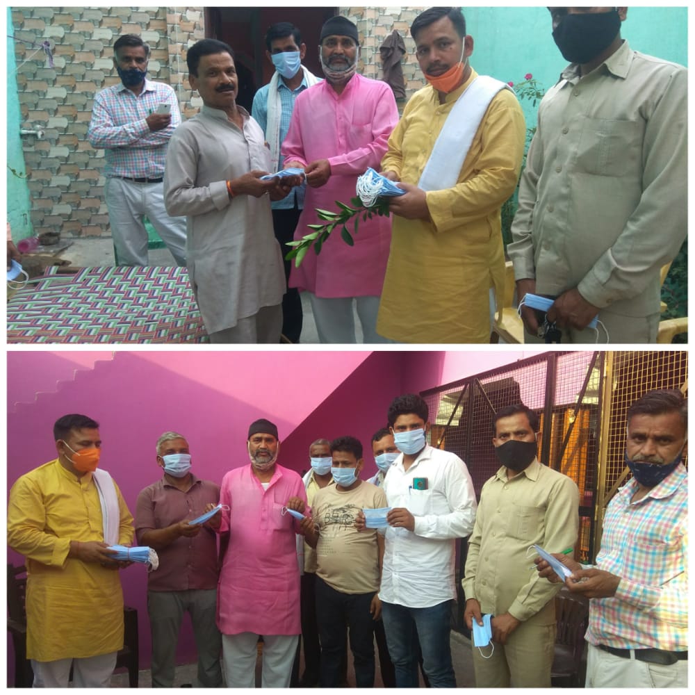 बरेली - केन्द्र सरकार के सात वर्ष पूर्ण होने के अवसर पर जिला महामंत्री ने किया सेनेटाइजर और मास्क बांटे।